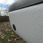 Close up of white spray on bedliner on bumper
