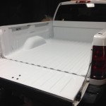 White Spray In Bedliner In Back of Truck 