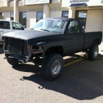 Front view sprayliner coated truck at Armaguard Edmonton